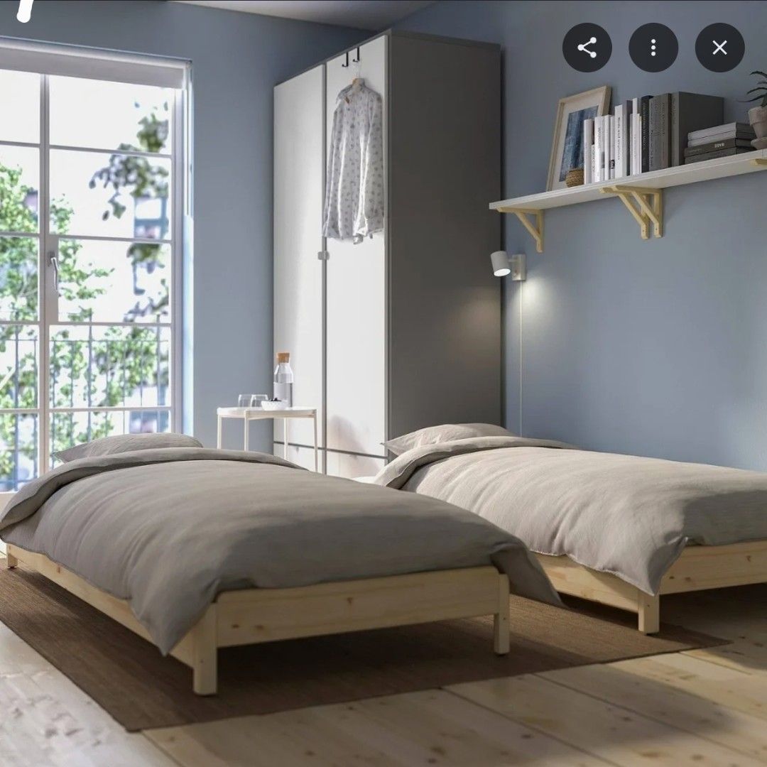 IKEA UTAKER Stackable Bed Pine Twin Single (Category: Bed Frames & Mattresses) located in Manila. Submitted by thebestre (Listing ID 1471074979, Image 2). Description: - Authentic IKEA stackable bed frame made of durable solid pine - Twin size, includes comfortable mattresses - Versatile design: pulls apart into two separate beds or stacks to save space - Natural wood grain finish with a clean, minimalist look - Fitted with solid wood slats for f