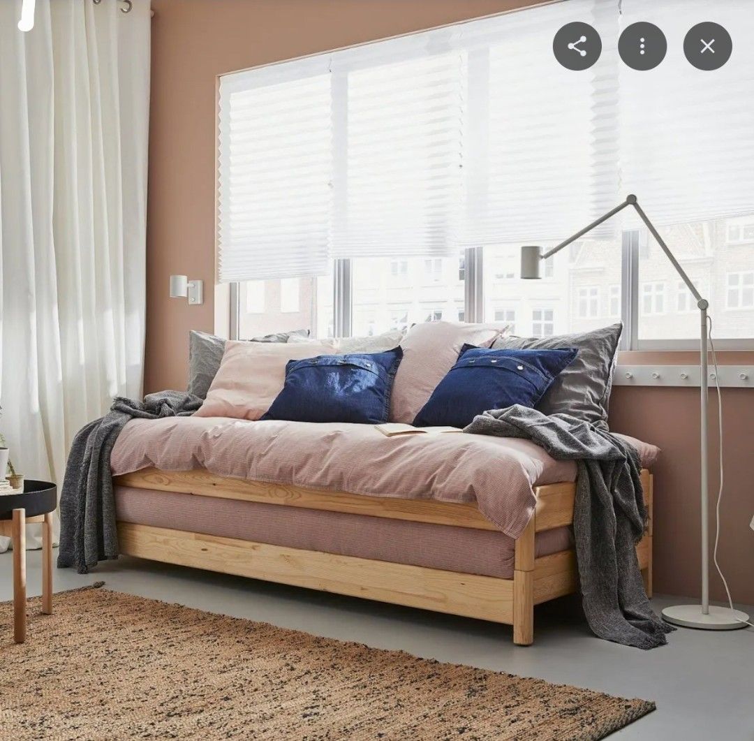 IKEA UTAKER Stackable Bed Pine Twin Single (Category: Bed Frames & Mattresses) located in Manila. Submitted by thebestre (Listing ID 1471074979, Image 3). Description: - Authentic IKEA stackable bed frame made of durable solid pine - Twin size, includes comfortable mattresses - Versatile design: pulls apart into two separate beds or stacks to save space - Natural wood grain finish with a clean, minimalist look - Fitted with solid wood slats for f