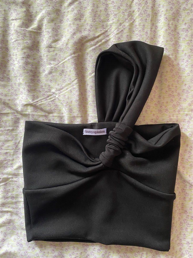 In My Opinion/IMO Black Bow Top (Category: Sleeveless) located in Quezon City. Submitted by damclothings.ph (Listing ID 1470949596, Image 1). Description: - Brand: In My Opinion - Style: Black tube top with a stylish tied bow detail on the front - Fit: Snug fit with comfortable, stretchy fabric - Condition: Clean overall with minimal signs of wear.
