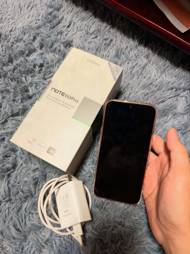 Infinix Note 60 Pro 256GB Orange (Category: Android Others) located in Manila. Submitted by jtg199x (Listing ID 1471071603, Image 2). Description: Infinix Note 60 Pro 5G in vibrant orange. Powered by the Snapdragon 7s Gen 4 processor with 256GB storage and 16GB extended RAM. Sound tuned by JBL. Includes the original box, clear case with MagSafe ring, fast charger, and cable. Everything pictured goes together in one package. NUNG MAY 2026 LANG BIN