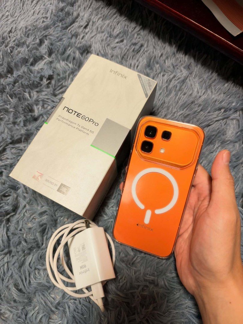 Infinix Note 60 Pro 256GB Orange (Category: Android Others) located in Manila. Submitted by jtg199x (Listing ID 1471071603, Image 1). Description: Infinix Note 60 Pro 5G in vibrant orange. Powered by the Snapdragon 7s Gen 4 processor with 256GB storage and 16GB extended RAM. Sound tuned by JBL. Includes the original box, clear case with MagSafe ring, fast charger, and cable. Everything pictured goes together in one package. NUNG MAY 2026 LANG BIN
