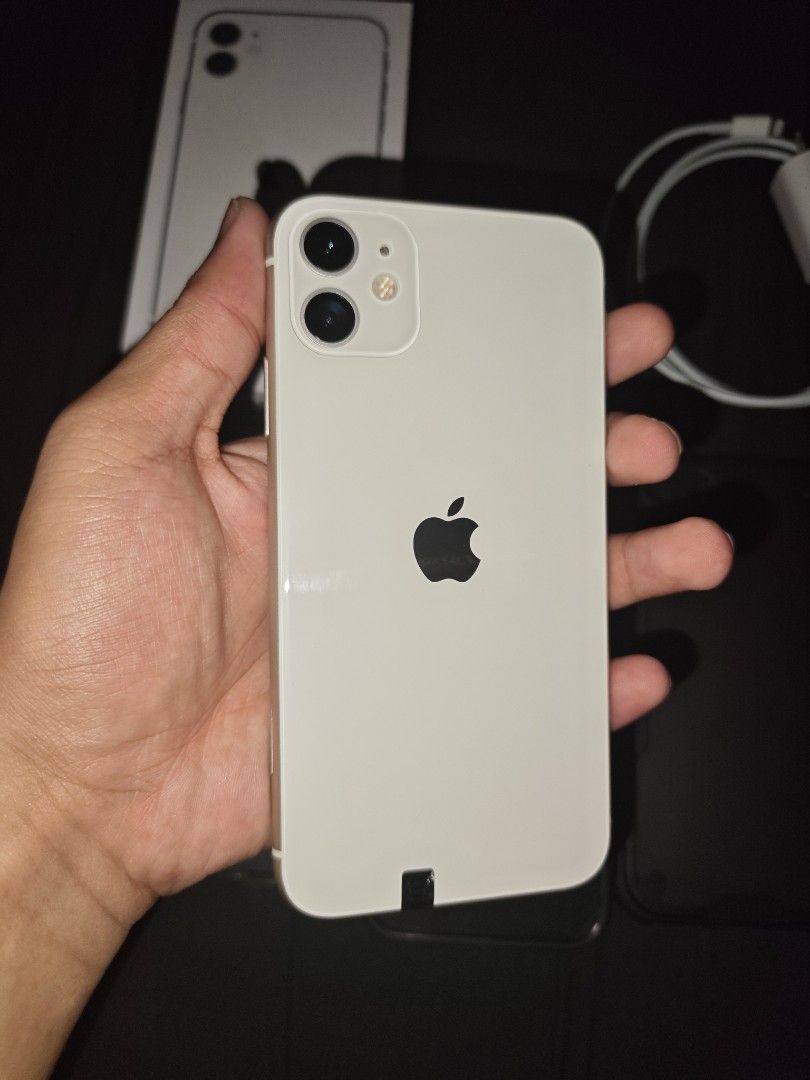 Iphone 11 128gb (Category: iPhone 11 Series) located in Cavite. Submitted by goldenphoenix.1919 (Listing ID 1470999195, Image 1). Description: Iphone 11 128gb White IOS 27.2 CH/A Vriant Factory Unlocked. Dual Sim Bought it from Nicolai Gadgets Shop for 12.3k 100% Battery Health Working True Tone and Face ID INCLUSIONS: Box Charging adapter and lightning cable 3 cases 1 extra tempered glass Receipt NO ISSUES PO. SOBRANG KINIS PA. NO UKNOWN PARTS. 