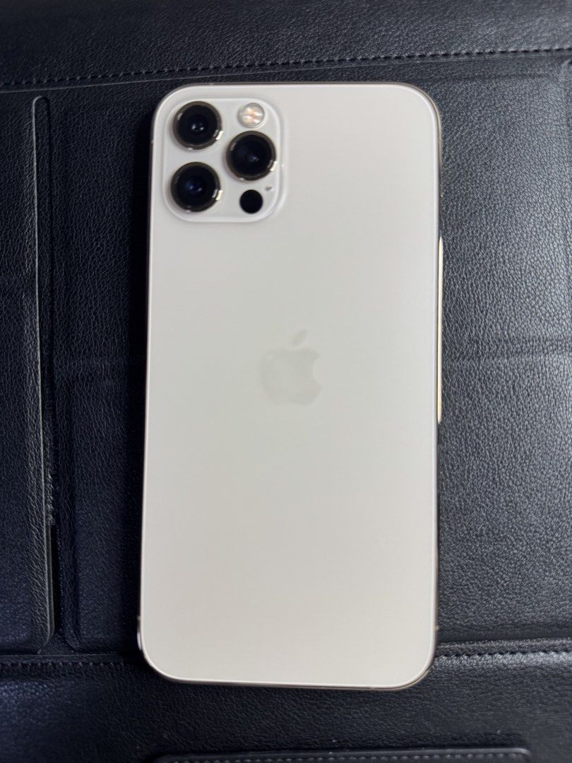 Iphone 12 pro 128gb gold (Category: iPhone 12 Series) located in Manila. Submitted by jonn1 (Listing ID 1471117404, Image 3). Description: 📱 FOR SALE: iPhone 12 Pro – 128GB * Gold * Factory Unlocked (local unit, not HK) * NTC Approved * 76% Battery Health * No dents * 1st Owner * never been opened or repaired Inclusions: * Box (sames serial) * Charging cable * iPhone case * Tempered glass Good condition. PM for price and inquiries! 😊 Comes with