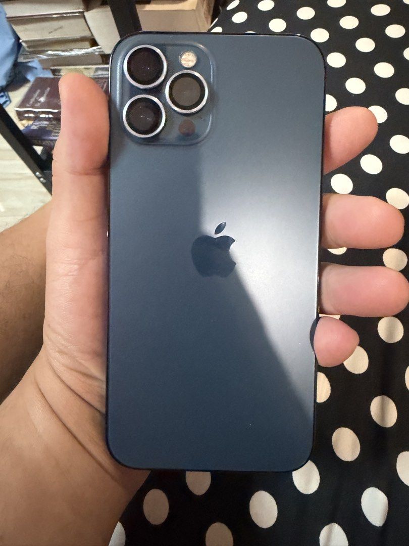 iPhone 12 Pro Max Pacific Blue 256GB (Category: iPhone 12 Series) located in Manila. Submitted by invinoveritas.670 (Listing ID 1471115157, Image 2). Description: - Model: iPhone 12 Pro Max - Storage Capacity: 256GB - Color: Pacific Blue - Condition: Excellent physical condition with clean screen and body - Inclusions: Original retail box included -issue small scratches as seen sa pic not deep and not noticeable especially when you put tempered g