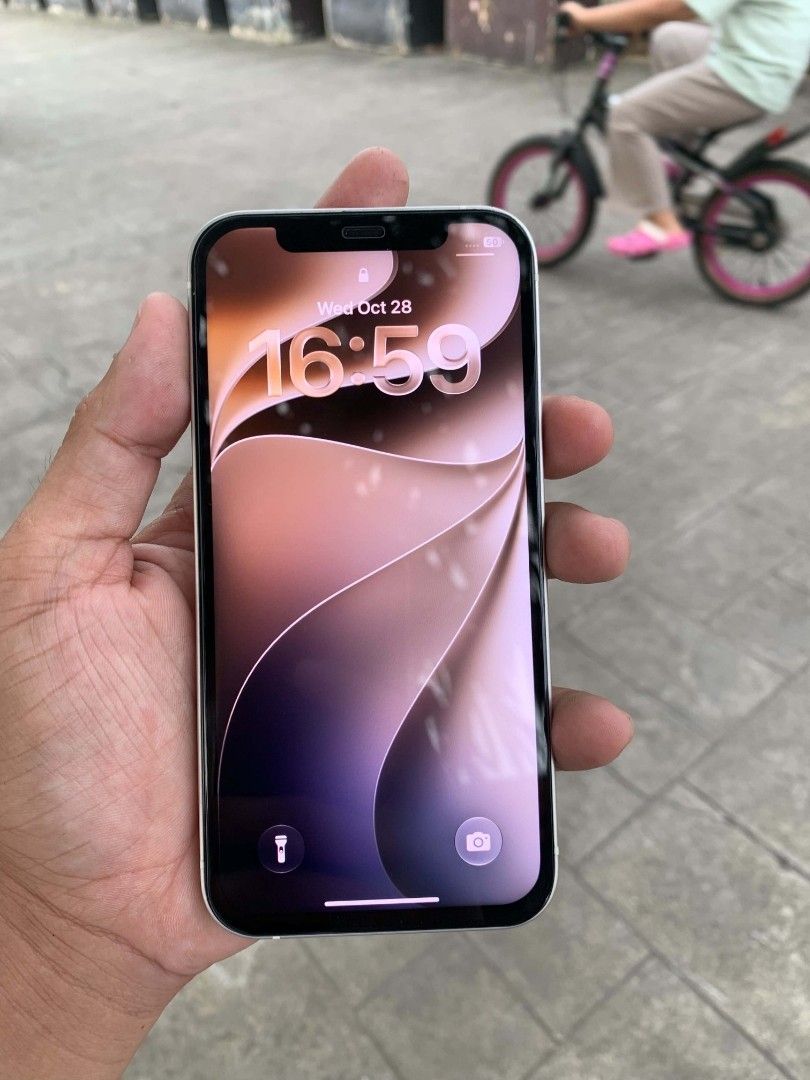IPHONE 12 WHITE 128GB (Category: Other Gadgets) located in San Jose del Monte. Submitted by ryangadjets_5426a4 (Listing ID 1470969079, Image 1). Description: LOOKING FOR BUYER IPHONE 12 128 STORAGE ANYNSIM UNLI RESET FACE ID WORKING TRUETONE WORKING REPLACEMENT LCD ORIGINAL ALL WORKING LAHAT. COMPLETE WITH BOX AND ORIGINAL APPLE CHARGER.