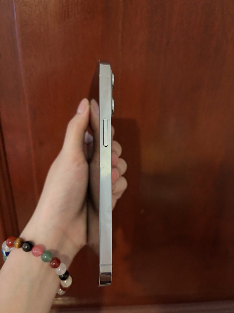 iPhone 13 Pro 128GB Silver (Category: iPhone 13 Series) located in Paranaque City. Submitted by fluttershyponyy (Listing ID 1471012827, Image 3). Description: -Pristine physical condition, no scratches or dents at all -Excellent camera quality for crisp, detailed photos and videos -Battery health: 74% -Bought brand new upon release Unit only — no inclusions Selling price: ₱20,000 Open for negotiation!.