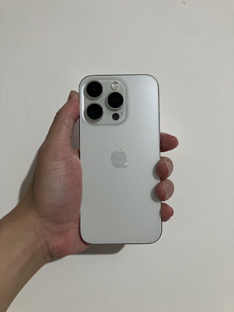 IPHONE 15 PRO 256gb (Category: iPhone 15 Series) located in Manila. Submitted by charles_102622 (Listing ID 1470989732, Image 1). Description: Iphone 15 pro 256gb White titanium NTC no history of repair, all original parts 74% battery health, still original No issue all working, no dents or scratches Naka tempered Inclusions: ugreen cord, case and unit ₱31,500 📍Bulacan area.