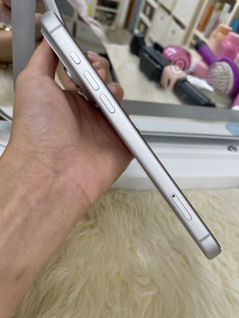 iPhone 17 PM 512Gb (Category: iPhone 17 Series) located in Manila. Submitted by janethebrave (Listing ID 1470995816, Image 3). Description: AE - Color: Silver ❗️RUSH ❗️ - Display: Dynamic Island, standard one-hand friendly size - Camera: Triple camera setup on the lower part has scratches since i put camera protector before my fault - Condition: Clean glass without scratches, fully functional buttons, and a pristine charging port - Performance: W