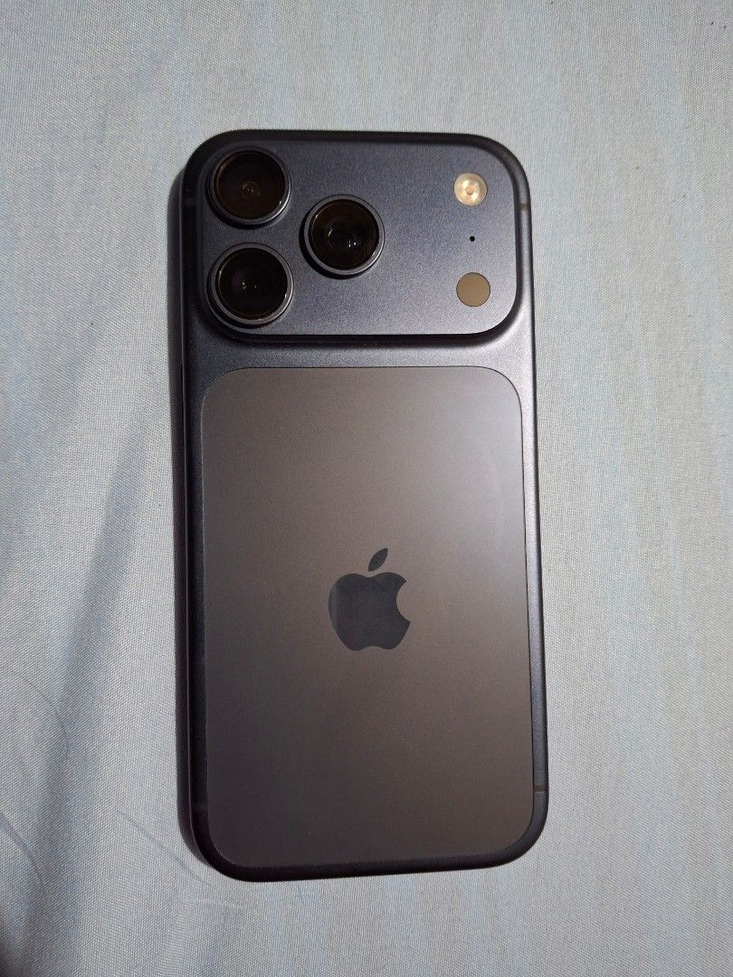 Iphone 17 Pro Deep blue (Category: iPhone 17 Series) located in Pasay City. Submitted by annieuy13 (Listing ID 1471103461, Image 1). Description: open line/no sim restrictions lady owned no dents/no cracks no scratches purchased october 2025 with charger rfs: will upgrade to iphone 18.