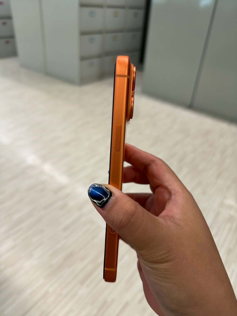 iPhone 17 pro max 256gb with Original Box (Category: iPhone 17 Series) located in Valenzuela. Submitted by wisewhale_46982b (Listing ID 1470967474, Image 3). Description: - Openline - Vibrant bright orange color - Clean screen with top notch and thin bezels - Triple camera setup on the back - Fully functional side buttons - Includes original retail box - 100% ready for daily use.