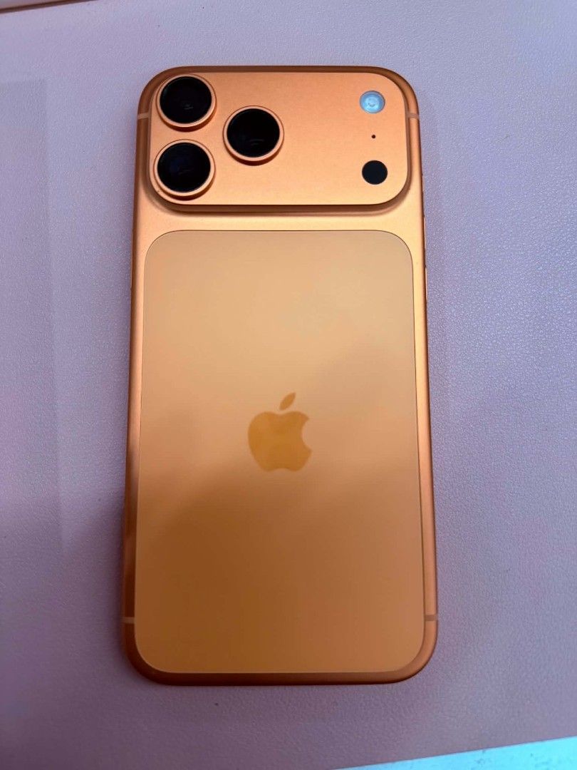 iPhone 17 pro max 256gb with Original Box (Category: iPhone 17 Series) located in Valenzuela. Submitted by wisewhale_46982b (Listing ID 1470967474, Image 2). Description: - Openline - Vibrant bright orange color - Clean screen with top notch and thin bezels - Triple camera setup on the back - Fully functional side buttons - Includes original retail box - 100% ready for daily use.