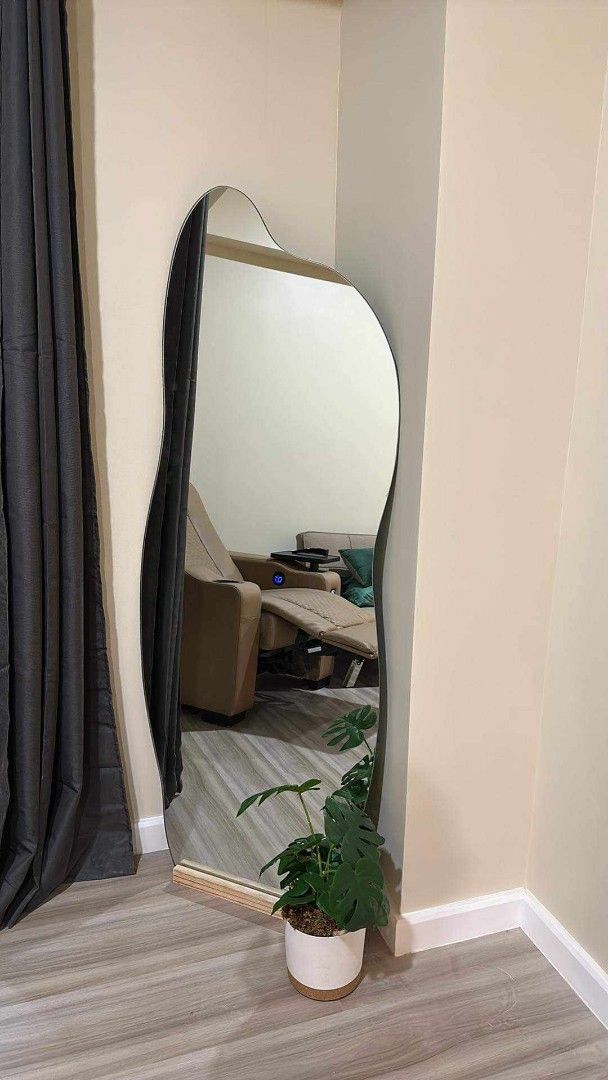 Irregular Asymmetrical Full Length Standing Mirror (Category: Mirrors) located in Manila. Submitted by zeruve_mirrors (Listing ID 1471075033, Image 3). Description: - Trendy wavy full-length mirror with a unique asymmetrical shape - Sturdy and High Quality manufactured materials - Perfect statement piece for bedrooms, entryways, or living spaces - Modern aesthetic designed to lean against the wall - For pick-up or delivery within Metro Manila -Ca