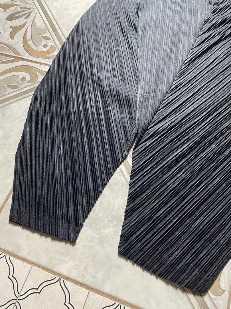 Issey Miyake Pleats Please Irregular Pants (Category: Luxury Apparel) located in Quezon City. Submitted by renovare.196 (Listing ID 1471077725, Image 2). Description: Issey Miyake Pleats Please Irregular Pants As New Condition Color Rate: 9.8/10 No Issue Measurements • Width: Free size • Length: 37.5 • Thigh: 16.5 • Hem: 6 Price: 12500 obo DM IF INTERESTED📥.