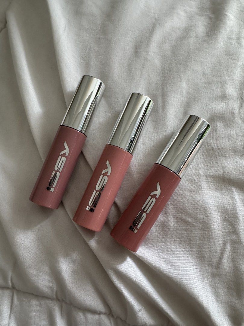 Issy Lip Lacquer Longwear Liquid Lip Shine Set (Category: Makeup) located in Pasig City. Submitted by vanillaice__ (Listing ID 1470942456, Image 1). Description: - Brand new - Cowgirl, Two faced, and Behave - can be sold individually for 150 each - Finish: High-shine with rich color payoff - Formula: Longwear liquid lip shine - Packaging: Transparent pinkish bodies with silver caps - Perfect for daily wear and as a complete collection.