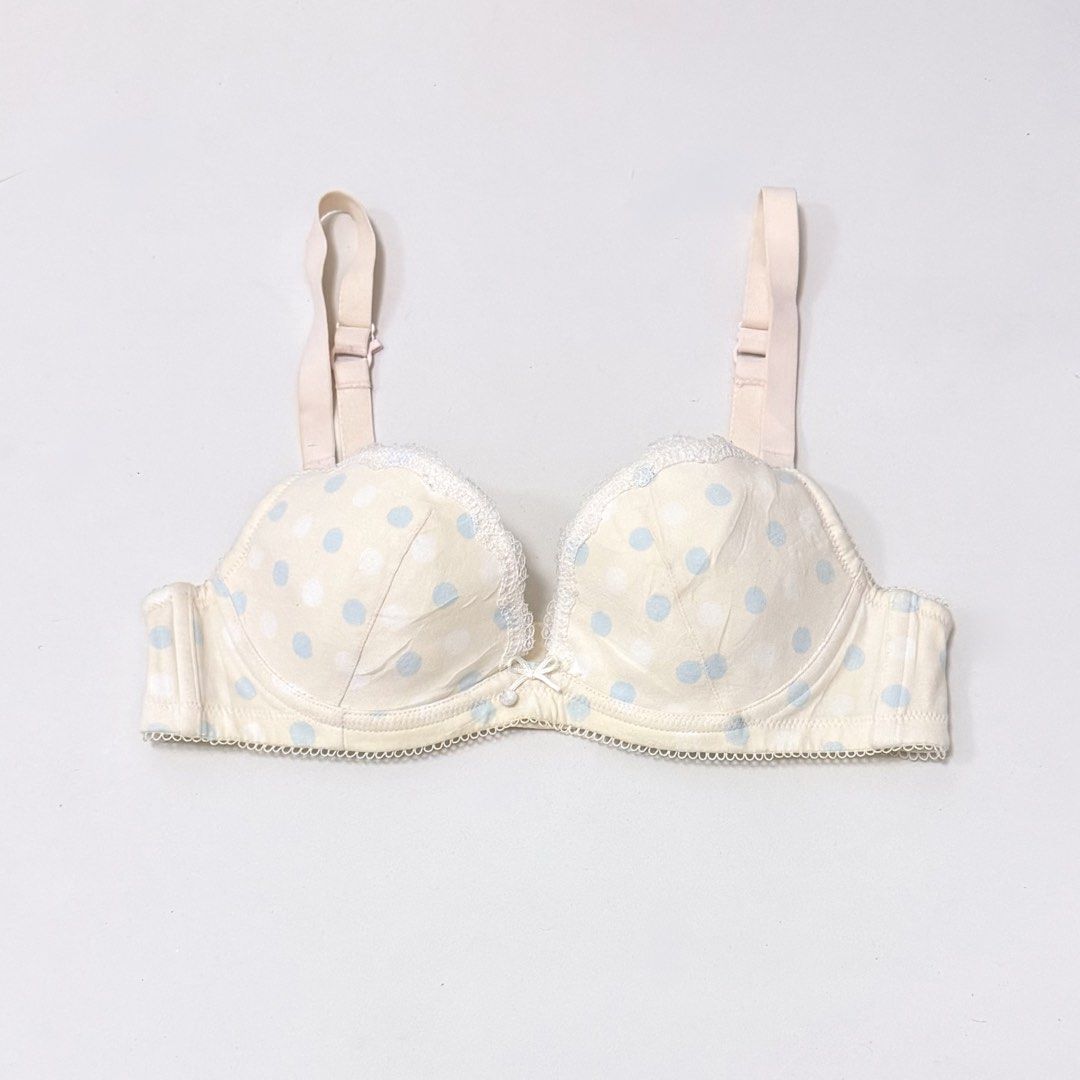 Ivory & Blue Polka Pattern Underwired Cotton Bra [36AB] (Category: Undergarments & Loungewear) located in Malabon City. Submitted by k_intimates (Listing ID 1471098613, Image 1). Description: Details: • Size 36AB / wired / lightly lined • No issues. Very minimal sign of wear. • Ivory underwired bra featuring a blue polka dot pattern and delicate lace trim along the top of the cups..