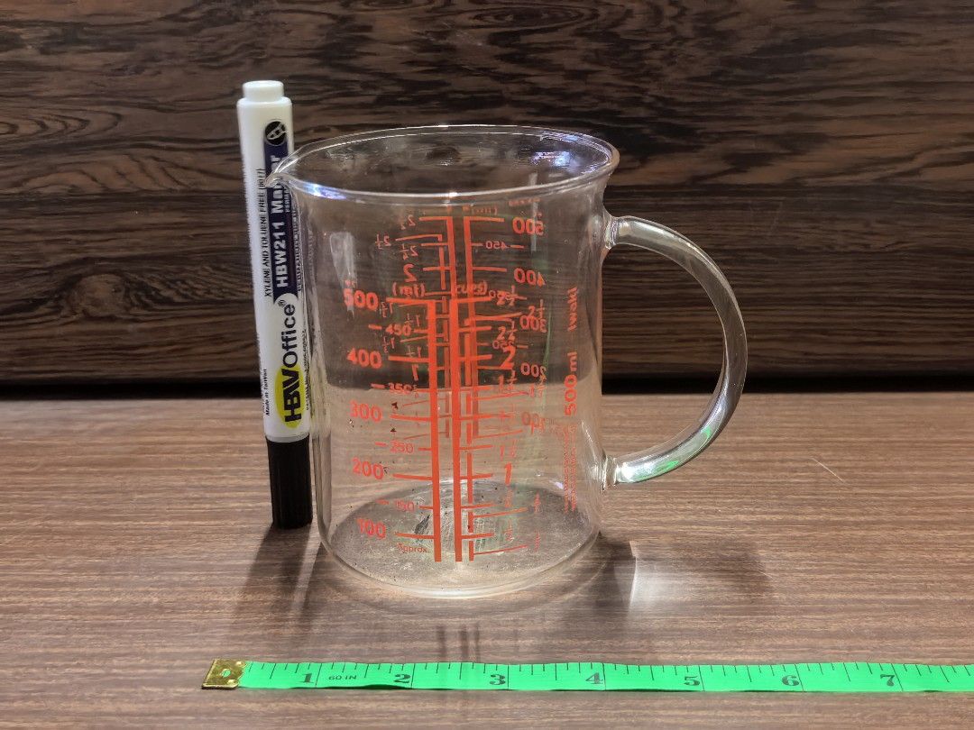 Iwaki 500ml Glass Measuring Cup with Handle (Category: Coffee & Tea Tableware) located in Rizal. Submitted by gkstcenit (Listing ID 1471072350, Image 3). Description: LASTPRICE 150 - Brand: Iwaki - Capacity: 500ml - Material: Clear heat-resistant glass - Features: Red printed ml and cup measurements, convenient pour spout, and sturdy handle - Condition: Used with some faint marks, but overall in good usable condition - Perfect for baking, cooking
