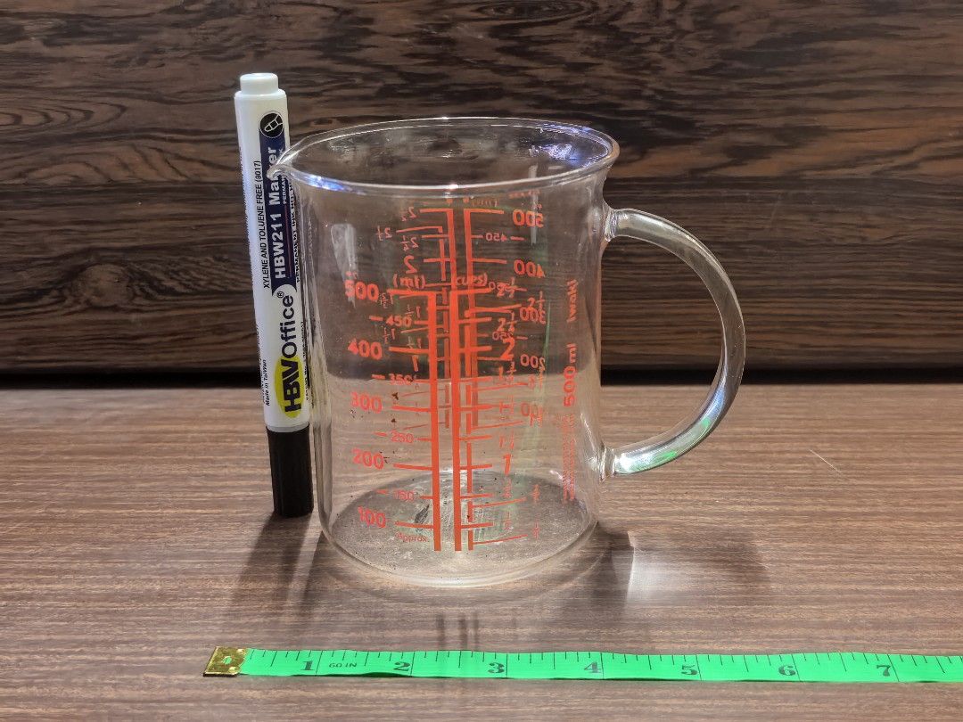 Iwaki 500ml Glass Measuring Cup with Handle (Category: Coffee & Tea Tableware) located in Rizal. Submitted by gkstcenit (Listing ID 1471072350, Image 2). Description: LASTPRICE 150 - Brand: Iwaki - Capacity: 500ml - Material: Clear heat-resistant glass - Features: Red printed ml and cup measurements, convenient pour spout, and sturdy handle - Condition: Used with some faint marks, but overall in good usable condition - Perfect for baking, cooking