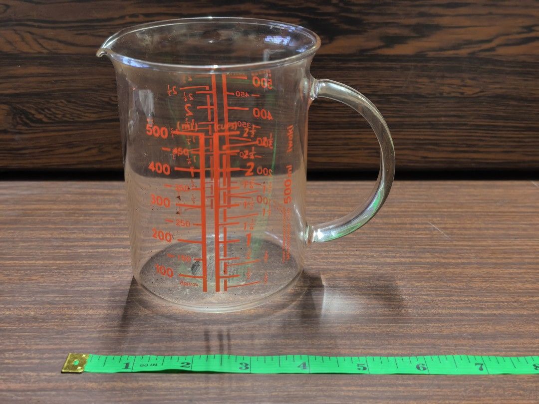 Iwaki 500ml Glass Measuring Cup with Handle (Category: Coffee & Tea Tableware) located in Rizal. Submitted by gkstcenit (Listing ID 1471072350, Image 1). Description: LASTPRICE 150 - Brand: Iwaki - Capacity: 500ml - Material: Clear heat-resistant glass - Features: Red printed ml and cup measurements, convenient pour spout, and sturdy handle - Condition: Used with some faint marks, but overall in good usable condition - Perfect for baking, cooking