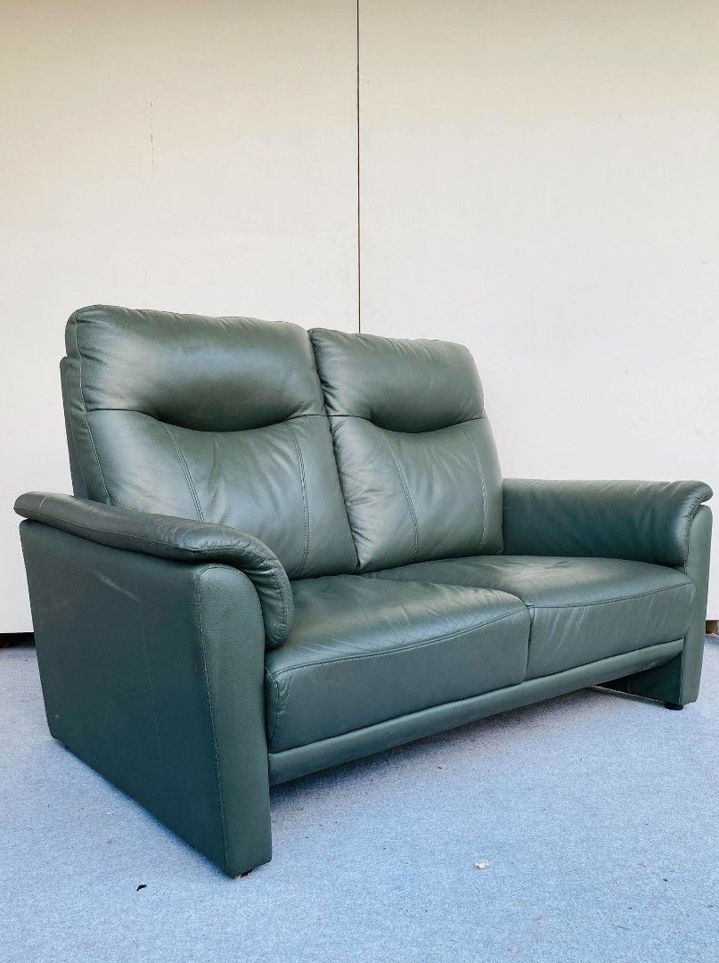 JAPAN SURPLUS" 2-SEATER HIGHBACK DARK GREEN LEATHER SOFA (Category: Sofas) located in Manila. Submitted by adrian_ocean (Listing ID 1470937505, Image 2). Description: "JAPAN SURPLUS" 2-SEATER HIGHBACK DARK GREEN LEATHER SOFA SIZE: 56L" x 36W" x 16Sh" x 37H" inches (AS-IS ITEM) IN GOOD CONDITION.