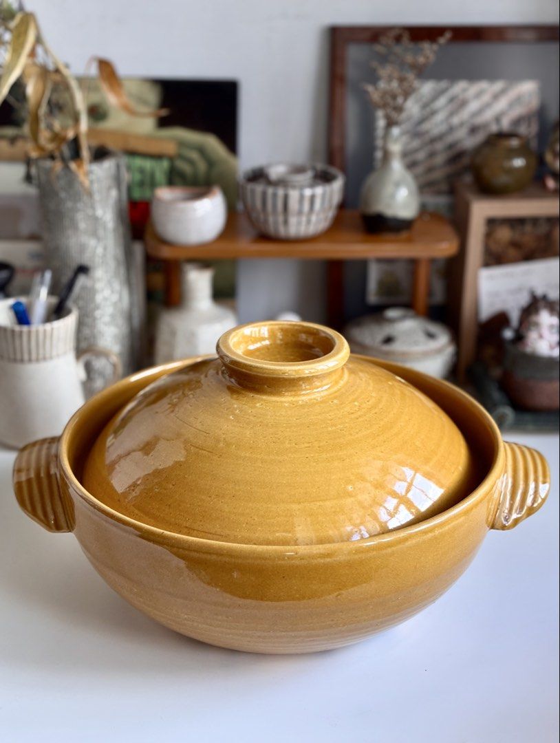 Japanese Ceramic Donabe Clay Pot (Category: Cookware & Accessories) located in Manila. Submitted by jullialm (Listing ID 1471094292, Image 2). Description: Double sided handles hot pot, stews, and soups pot Condition: good/used, with signs of usage inside and under only. Not visible when in use.