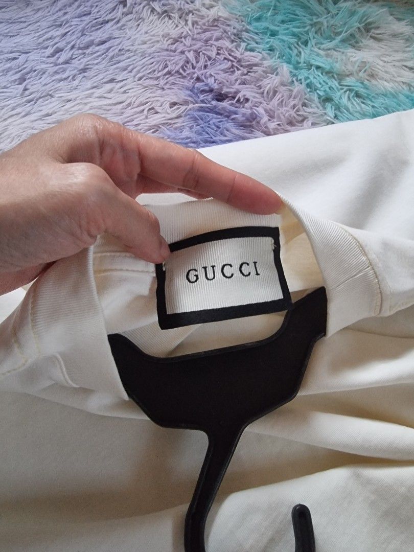 Jimin's shirt in Butter (Category: Shirts) located in Quezon City. Submitted by apspc (Listing ID 1471019518, Image 3). Description: Off white Jimin's shirt in their MV Butter. This was only used once. Width: shoulder to shoulder - 20 inches length: shoulder down - 26 inches Payment via GCash..