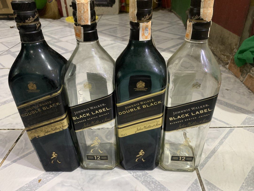Johnnie Walker Empty Whisky Bottles Lot (Category: Beverages) located in Antipolo. Submitted by cebb888 (Listing ID 1470999810, Image 1). Description: - Set of 4 empty Johnnie Walker bottles - Includes 2 Double Black and 2 Black Label 12 Years old bottles - All original caps and tax stamps still attached - Ideal for DIY crafts, upcycling, home bar decor, or display - Selling as a set - Pick up or shipping options available -where is as is .. .