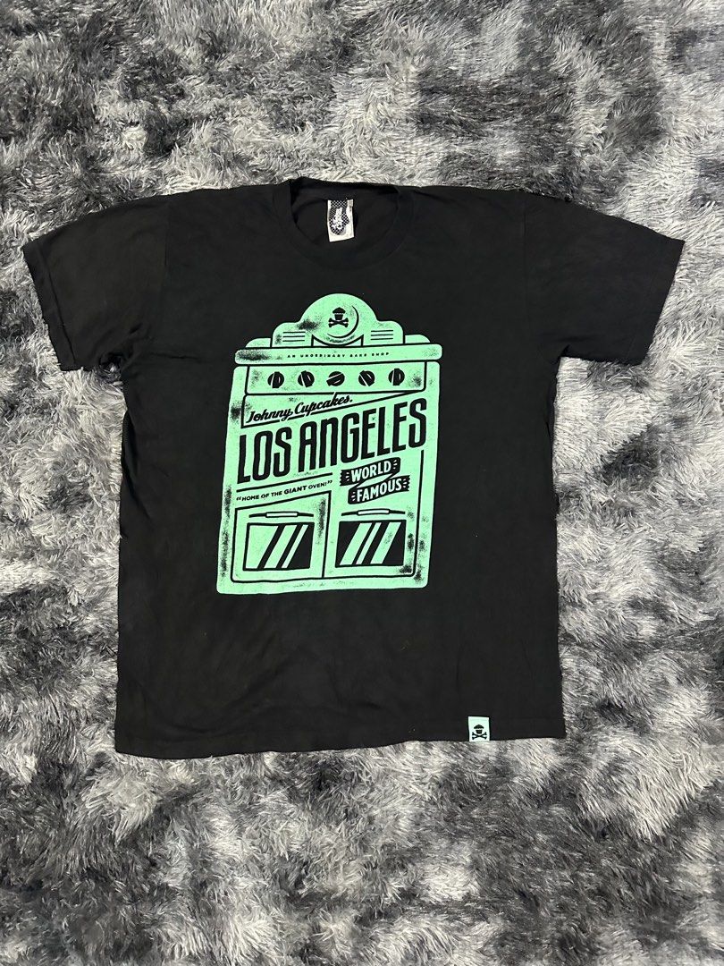 Johnny Cupcake Los Angeles Shirt (Category: Tshirts & Polo Shirts ) located in Baao. Submitted by revamped.co (Listing ID 1471045150, Image 1). Description: Johnny Cupcake Los Angeles Shirt Excellent Condition Size Large on Tag 22 by 29 Inches No Issue.