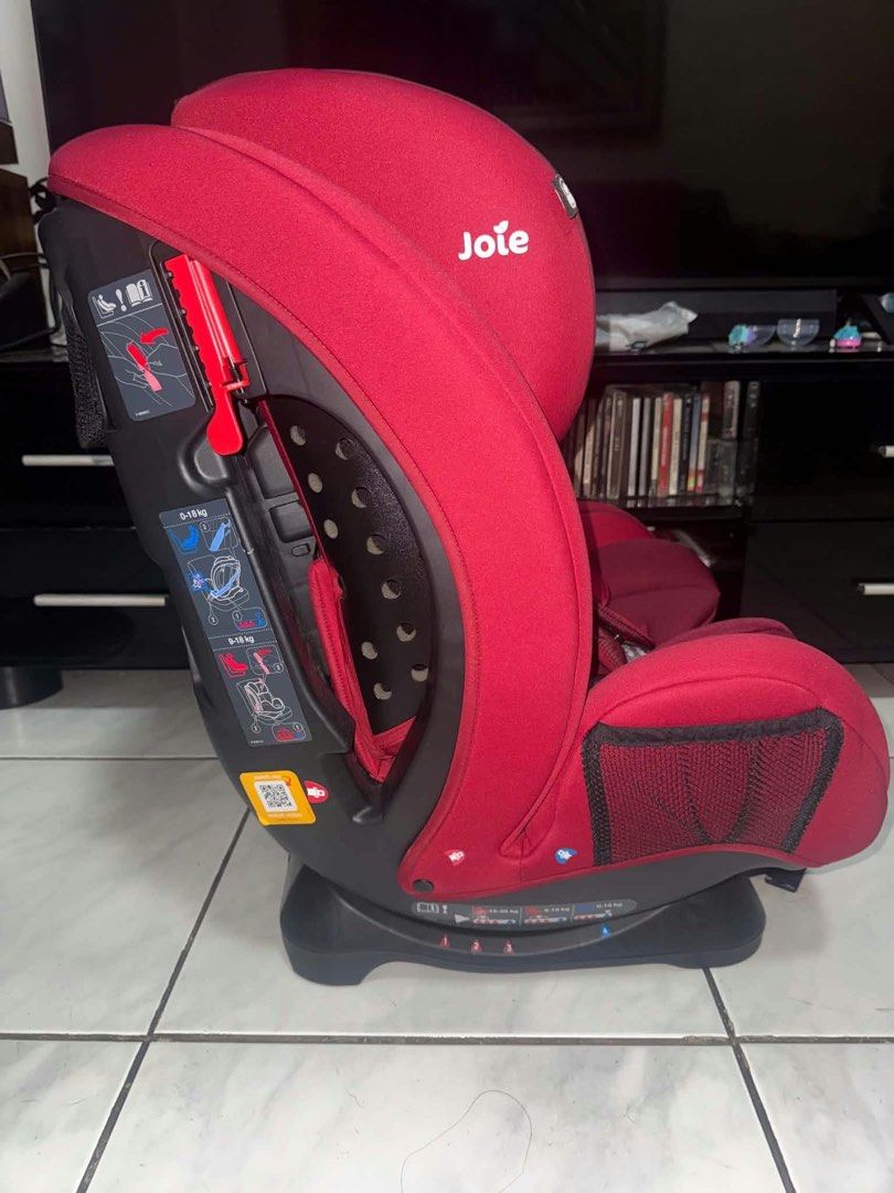 Joie Every Stage Car Seat Cranberry (Category: Car Seats) located in Manila. Submitted by scarletsabina (Listing ID 1471012639, Image 3). Description: - Model: Joie Every Stage Car Seat - Color: Cranberry Red with solid black plastic base - Age Range: Group 0+/1/2/3 (Newborn up to 12 years / 36 kg) - Installation: Uses vehicle seatbelt across all modes - Features: Adjustable headrest and harness system, handy side storage pockets - Condition: Cle