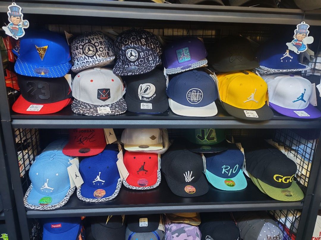 Jordan Cap (Category: Caps & Hats) located in Manila. Submitted by klej26 (Listing ID 1471015356, Image 1). Description: - Massive collection of Jordan snapback hats - Available in various colors, patterns, and logos - Flat brims and structured crowns - Select styles feature iconic elephant print brims and metallic details - High-quality embroidered Jumpman logos - DM us to choose your favorite style or ask questions.