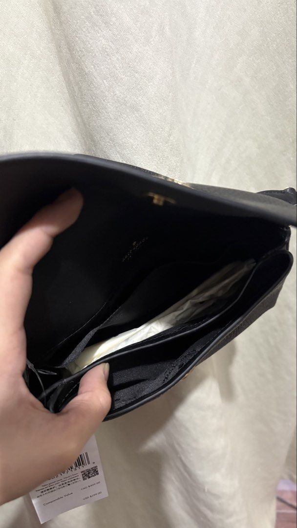 Kate Spade Sutton Mini Cbody Pebbled Leather Black (Category: Cross-body Bags) located in Manila. Submitted by ky.preloved1515 (Listing ID 1470947725, Image 3). Description: - Brand: Kate Spade - Model: Sutton Mini Crossbody - Material: Premium black pebbled leather - Hardware: Gold-tone hardware with front flap lettering - Interior: Fabric lining with convenient slip pockets - Condition: Brand new with original store tags (USD 299 price tag atta