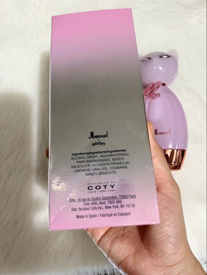 Katy Perry Meow Eau De Parfum 100ml (Category: Fragrance & Deodorants) located in Tiaong. Submitted by beautybyrosie (Listing ID 1471067178, Image 3). Description: - Brand: Katy Perry Meow Eau de Parfum original bought in USA - Size: 100 ml bottle - Condition: Brand new, unopened with original box - Bottle Design: Iconic pink cat-shaped bottle with rose gold collar and 'M' charm - Fragrance Notes: Sweet vanilla and fruity - Origin: Manufactured b