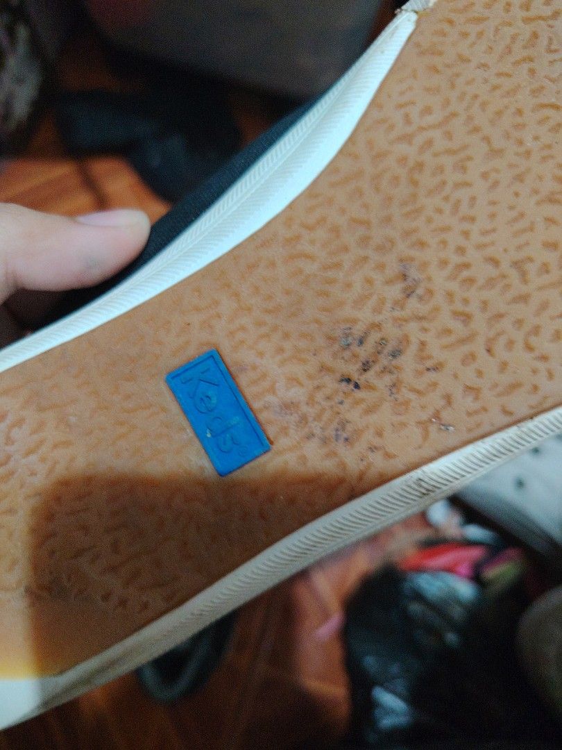 Keds Black Dream Foam Canvas Sneakers (Category: Sneakers) located in Marikina City. Submitted by yum3mi (Listing ID 1471009987, Image 2). Description: - Color: Black canvas with white laces and stitching - Comfort: Dream Foam insoles for extra cushioning - Sole: Gum rubber outsoles with classic blue Keds logo tag - Style: Versatile everyday shoes that match any casual outfit - Condition: Normal wear on the soles.