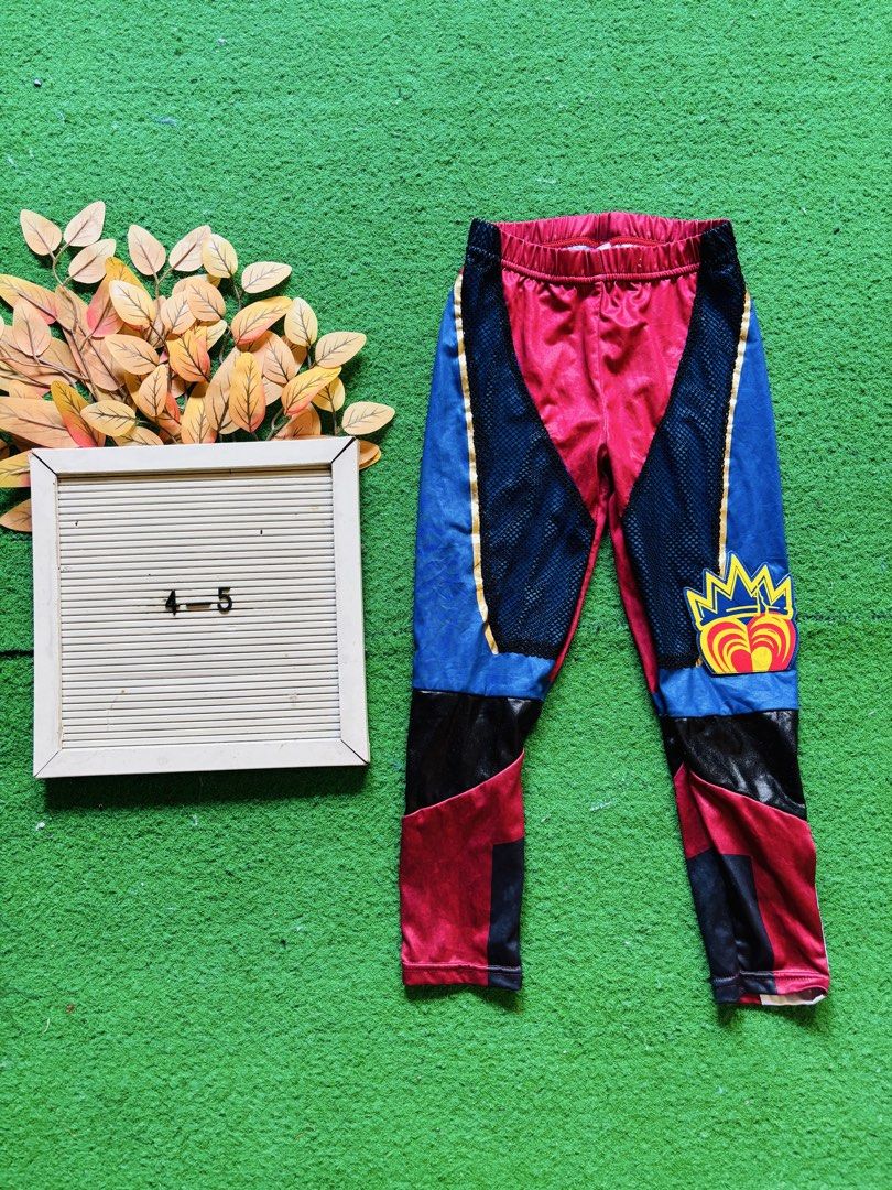 Kids multi-color patterned leggings size 4-5 (Category: Babies & Kids Fashion) located in San Mateo. Submitted by ariakid47 (Listing ID 1470991535, Image 1). Description: - Multi-color design: Bright red, blue, and black panels - Stylish details: Mesh side inserts and golden crown logo near the hem - Comfortable fit: Elastic waistband perfect for everyday wear - Size: Fits ages 4 to 5 years old.