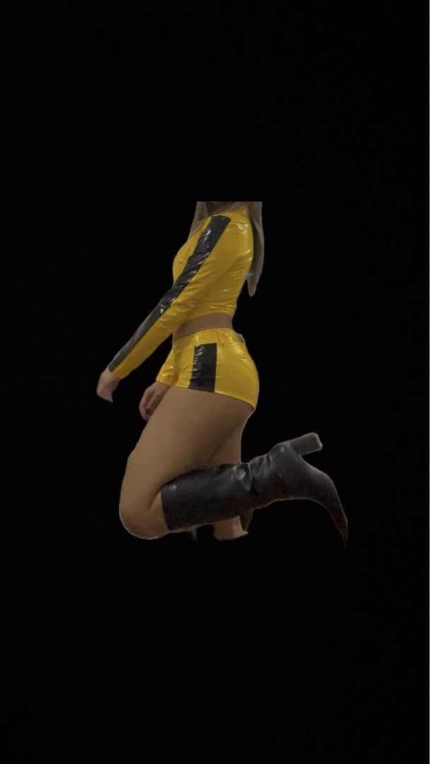 Kill bill costume for rent (Category: Sets or Coordinates) located in Pasig City. Submitted by archivesbym (Listing ID 1471020425, Image 2). Description: - Eye-catching bright yellow glossy faux leather two-piece set - Bold black racing stripes running down sleeves and sides - Cropped zip-up jacket with a pointed collar and unique silver cross zipper pull - Matching high-waisted booty shorts equipped with belt loops - Ideal outfit for costume par