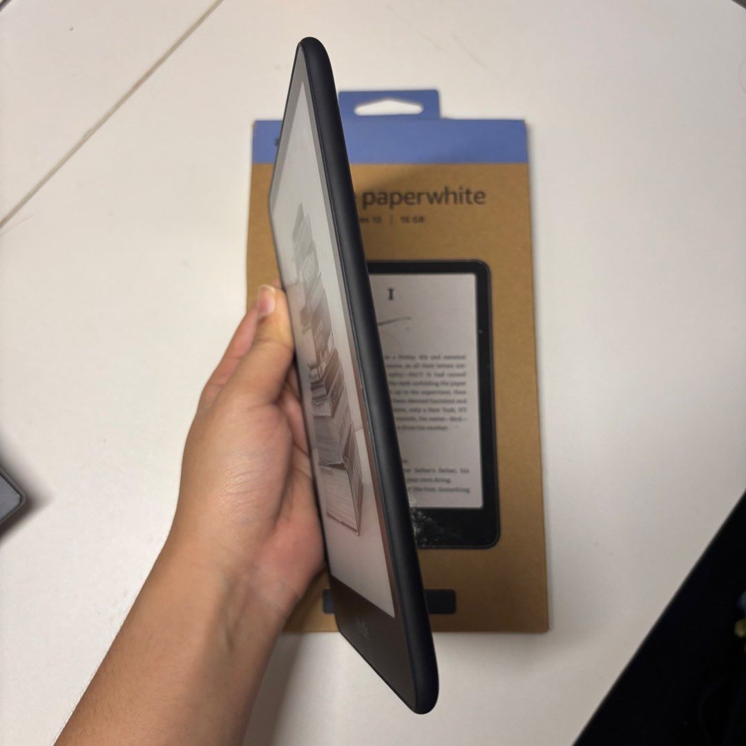 Kindle Paperwhite 12th Edition | 16GB (Category: E-Readers) located in Bocaue. Submitted by parsimonybysf (Listing ID 1471058770, Image 3). Description: for sale Kindle Paperwhite | 12th Gen | 16gb - complete inclusions (box and charger) - with case and popsocket - with screen protector - ad free (paid for it to be removed) no issues, seldom used lang.
