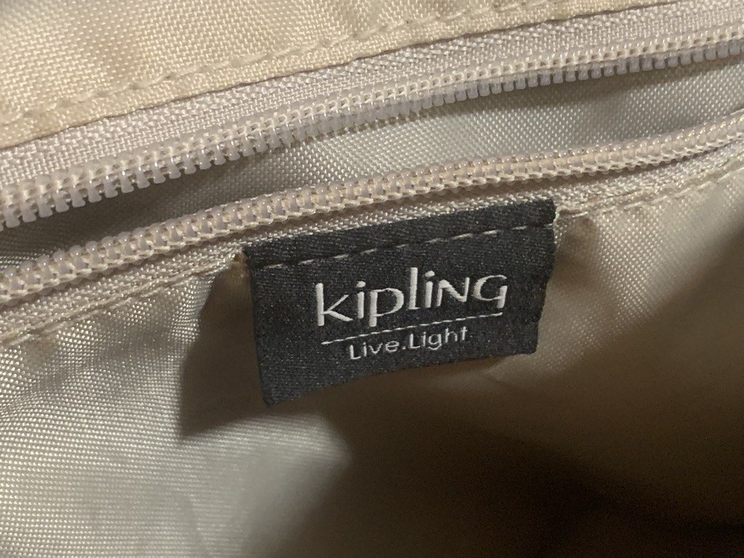 Kipling Black Patterned Mini Backpack (Category: Backpacks) located in Singapore. Submitted by luke81638 (Listing ID 1471037860, Image 4). Description: Details: - small backpack w 4 compartments - clean interior Condition: 9/10 - no visible damages Payment: cash or paynow.
