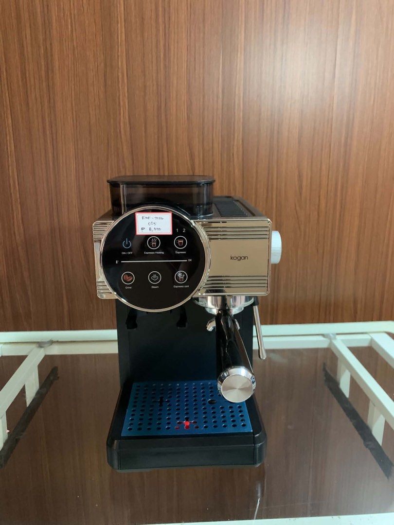Kogan Espresso Machine with Built-in Grinder EMF-1026 (Category: Coffee Machines & Makers) located in Pulilan. Submitted by sebbii (Listing ID 1470964182, Image 1). Description: - Model: Kogan EMF-1026 Espresso Machine - Finish: Clean black and chrome with a stylish blue drip tray - Built-in bean hopper with side-adjustable grind size settings - Digital touch control panel for easy heating, steam, and shot extraction - Includes portafilter, built