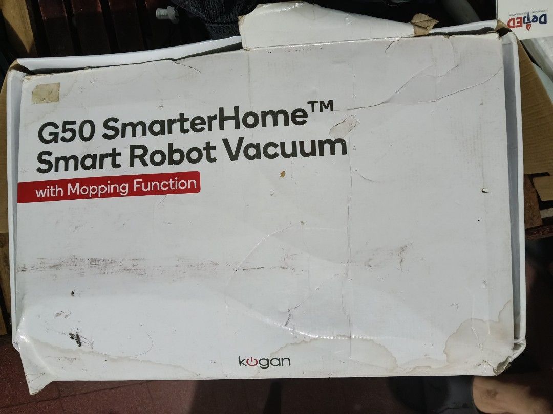 Kogan G50 SmarterHome Smart Robot Vacuum with Mopping Function (Category: Vacuum Cleaner & Housekeeping) located in Quezon City. Submitted by markjohnbonganay (Listing ID 1470996709, Image 1). Description: - Model: Kogan G50 Smart Robot Vacuum Cleaner - Color: Sleek Black - Features: 2-in-1 Vacuum and Mopping function - Inclusions: Charging base, water tank, and complete accessories - Packaging: Comes with original box - Condition: Shows minor du