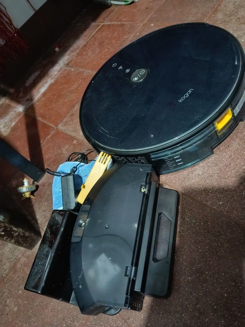 Kogan G50 SmarterHome Smart Robot Vacuum with Mopping Function (Category: Vacuum Cleaner & Housekeeping) located in Quezon City. Submitted by markjohnbonganay (Listing ID 1470996709, Image 2). Description: - Model: Kogan G50 Smart Robot Vacuum Cleaner - Color: Sleek Black - Features: 2-in-1 Vacuum and Mopping function - Inclusions: Charging base, water tank, and complete accessories - Packaging: Comes with original box - Condition: Shows minor du