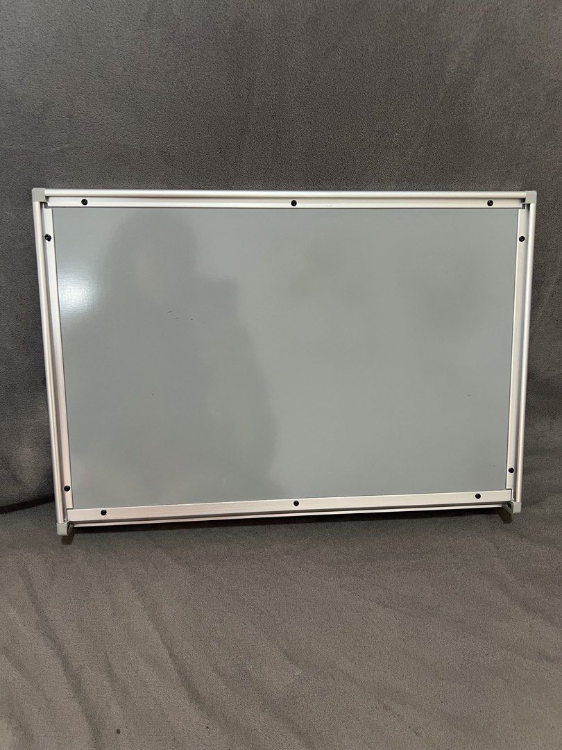 Kokuyo FB-115W Whiteboard (Category: Stationery & School Supplies) located in Las Pinas. Submitted by maple0305 (Listing ID 1470955935, Image 3). Description: - Brand: Kokuyo White Board (Model FB-115W) - Condition: Excellent, clean white surface - Frame: Sturdy silver aluminum frame with integrated bottom marker tray - Inclusions: Unused manual and eraser (still sealed in original plastic wrap) - Features: Reinforced mounting hardware screw slot