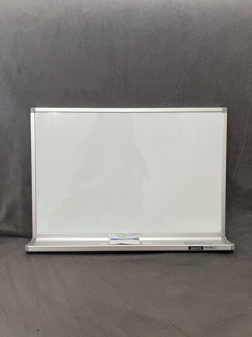 Kokuyo FB-115W Whiteboard (Category: Stationery & School Supplies) located in Las Pinas. Submitted by maple0305 (Listing ID 1470955935, Image 1). Description: - Brand: Kokuyo White Board (Model FB-115W) - Condition: Excellent, clean white surface - Frame: Sturdy silver aluminum frame with integrated bottom marker tray - Inclusions: Unused manual and eraser (still sealed in original plastic wrap) - Features: Reinforced mounting hardware screw slot