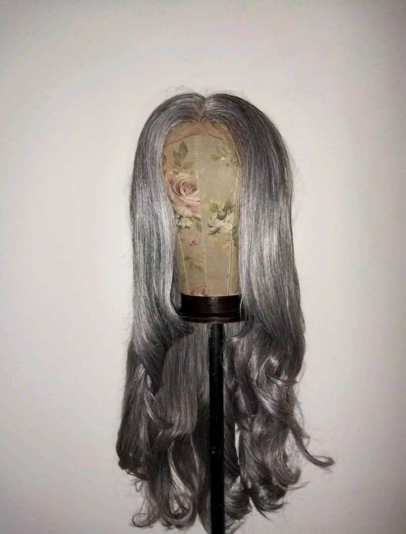 Lace front wig synthetic (Category: Hair) located in Davao. Submitted by dollcollector495 (Listing ID 1471090171, Image 2). Description: 13x6 33 inches long - Color: Medium ash grey tone - Style: Long curly wig with soft, flowing waves - Construction: Lace front with natural-looking parting space - Fit: Adjustable .
