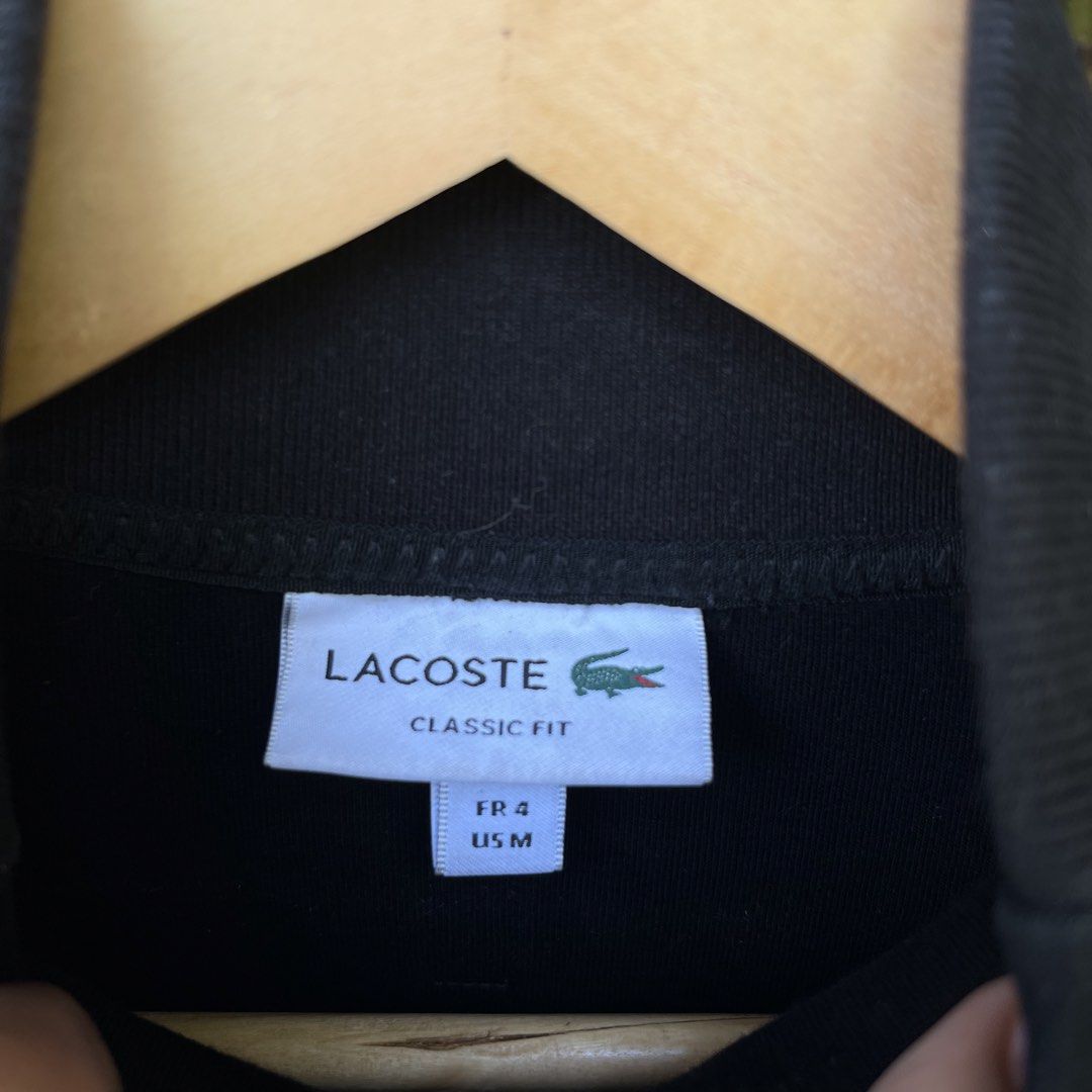 Lacoste Black Full Zip Classic Fit Track Jacket (Category: Coats, Jackets and Outerwear) located in Davao. Submitted by streetsight (Listing ID 1471020386, Image 3). Description: - Brand: Lacoste - Style: Full-zip jacket in classic fit - Size: FR 4 / US Medium - Color: Solid black with tonal black crocodile logo - Details: High collar, front pockets, ribbed hem and cuffs - Condition: Clean piece, perfect everyday basic.