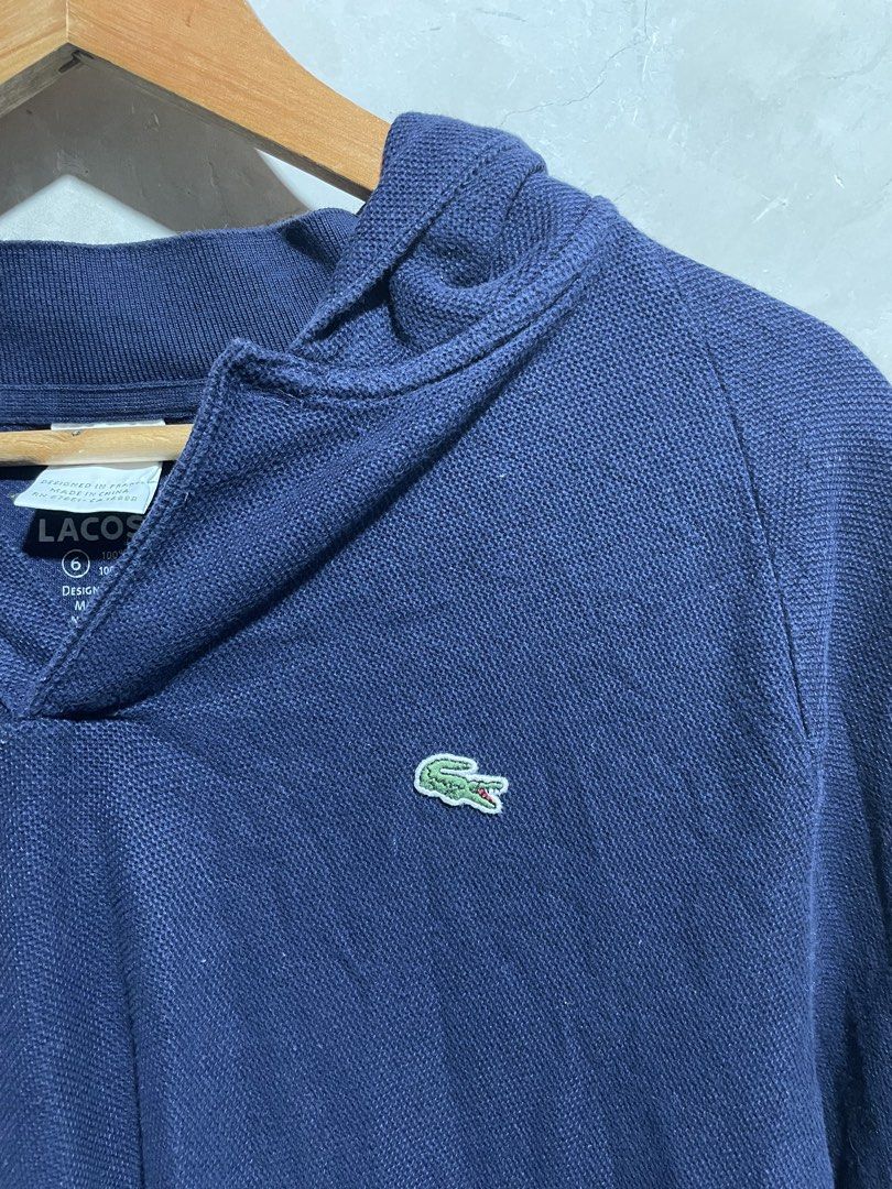 Lacoste Navy Blue Hooded Sweater (Category: Coats, Jackets and Outerwear) located in Zamboanga. Submitted by guthens (Listing ID 1471073179, Image 3). Description: Condition- excellent Issue- discoloration check the last pic Color rate- 9.5/10.