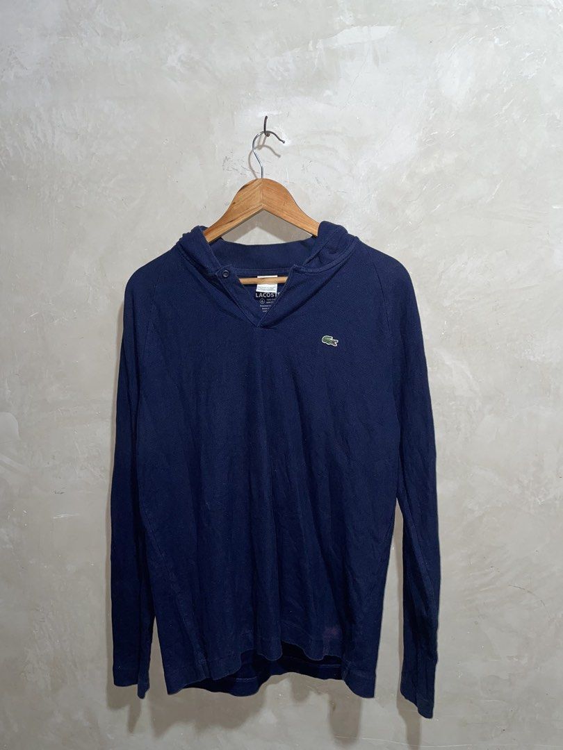 Lacoste Navy Blue Hooded Sweater (Category: Coats, Jackets and Outerwear) located in Zamboanga. Submitted by guthens (Listing ID 1471073179, Image 1). Description: Condition- excellent Issue- discoloration check the last pic Color rate- 9.5/10.