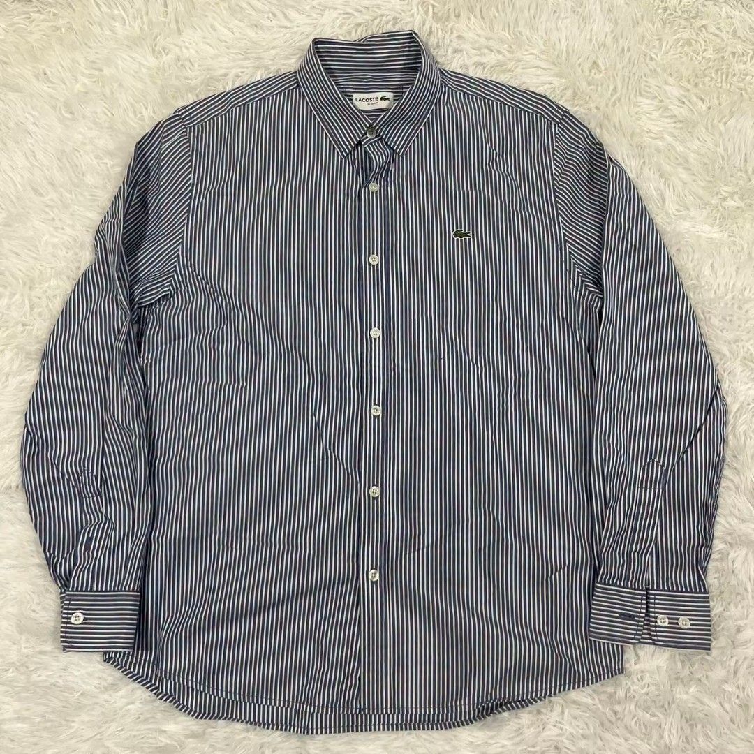 LACOSTE PINSTRIPE CLASSIC LOGO POLO (Category: Formal Shirts) located in Manila. Submitted by lunaras_declutter (Listing ID 1471112556, Image 1). Description: LARGE GOOD AS NEW 9.8 COLOR RATE NO. FLAWS.