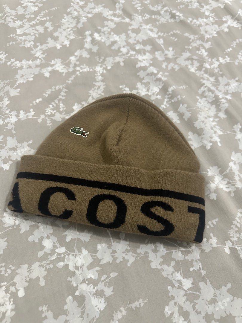 Lacoste Wool Scarf and Beanie Set Brown Black (Category: Scarves) located in Quezon City. Submitted by _samanthajyc (Listing ID 1471061403, Image 2). Description: - Brand: Lacoste - Set: Matching scarf and beanie combo - Colorway: Brown and black with large branding text and classic croc logo - Material: 100% wool, super warm for cold weather - Size: Unisex, one size fits all - Condition: Brand new with clean tags attached inside.