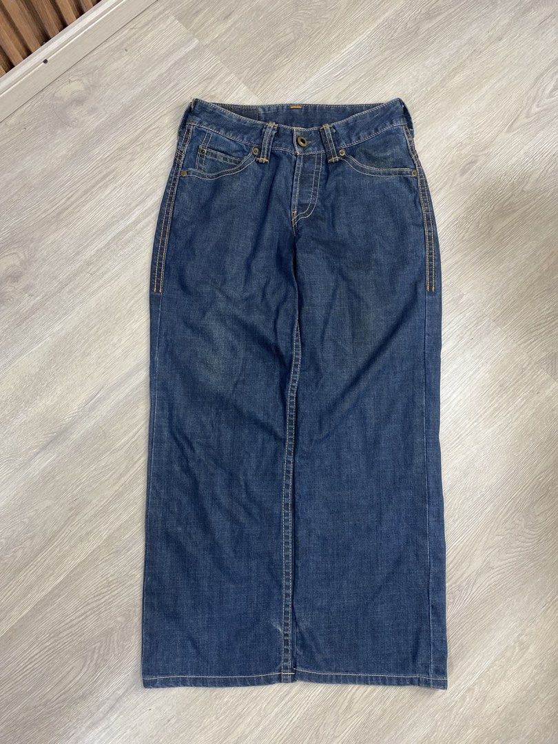 Levi Strauss & Co. Denim Jeans (Category: Jeans) located in Caloocan City. Submitted by heatedcaps4425 (Listing ID 1471099055, Image 2). Description: - Brand: Levi's - Style: Straight leg, classic 5-pocket design with belt loops - Color/Wash: Dark wash with contrast orange stitching - Details: Iconic red tab and 'Quality Never Goes Out Of Style' red leather-style back patch - Condition: Great for everyday wear.