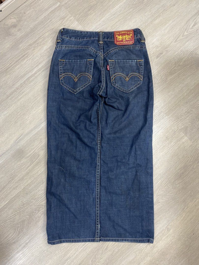 Levi Strauss & Co. Denim Jeans (Category: Jeans) located in Caloocan City. Submitted by heatedcaps4425 (Listing ID 1471099055, Image 1). Description: - Brand: Levi's - Style: Straight leg, classic 5-pocket design with belt loops - Color/Wash: Dark wash with contrast orange stitching - Details: Iconic red tab and 'Quality Never Goes Out Of Style' red leather-style back patch - Condition: Great for everyday wear.