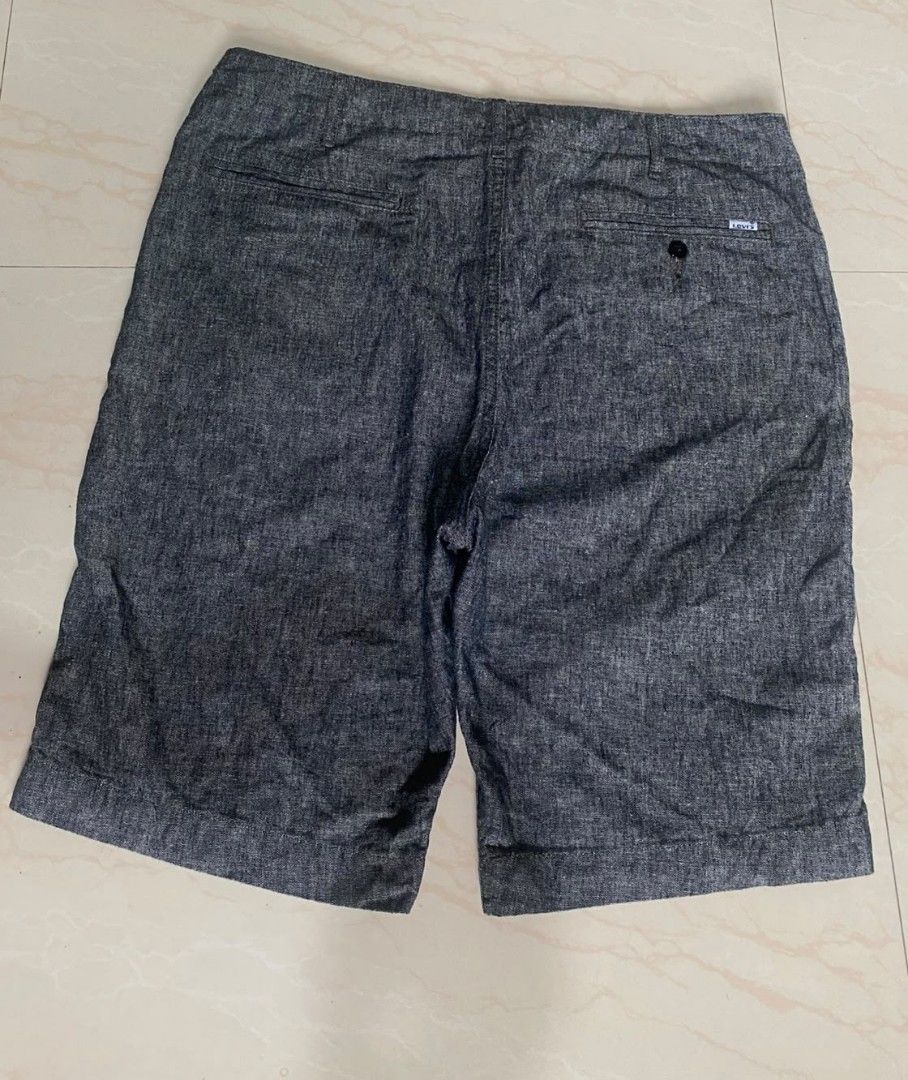 Levis Chino Short (Category: Shorts) located in Santo Tomas. Submitted by liyothrift (Listing ID 1470932299, Image 3). Description: Levi's men's gray chambray/ linen-blend flat-front chino shorts. Excellent condition Width 34-36 Length 22 Loc Santo Tomas DDN 8112.